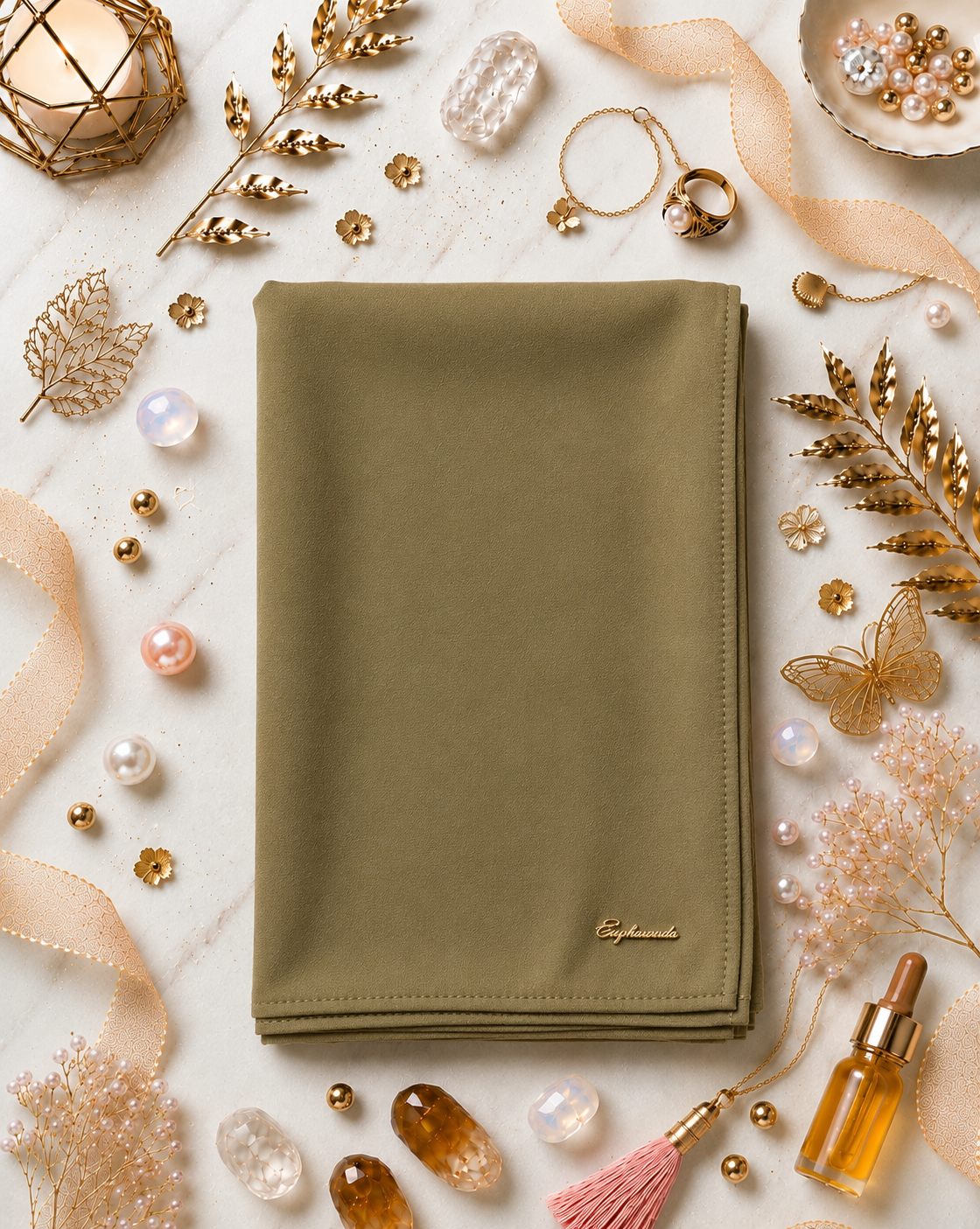Graceful chiffon shawls with a soft, flowy drape. Light and airy, perfect for everyday wear or special occasions, finished with a subtle logo for a touch of understated elegance.