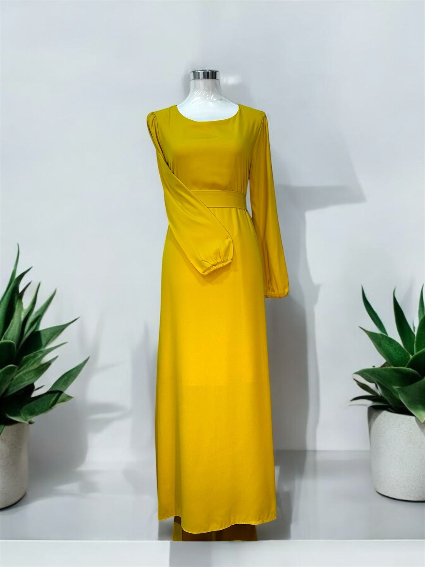 Minimalist Dress,
Mustard,  invisible zip
at the back with
elastic cuff and comes
with a fabric belt
