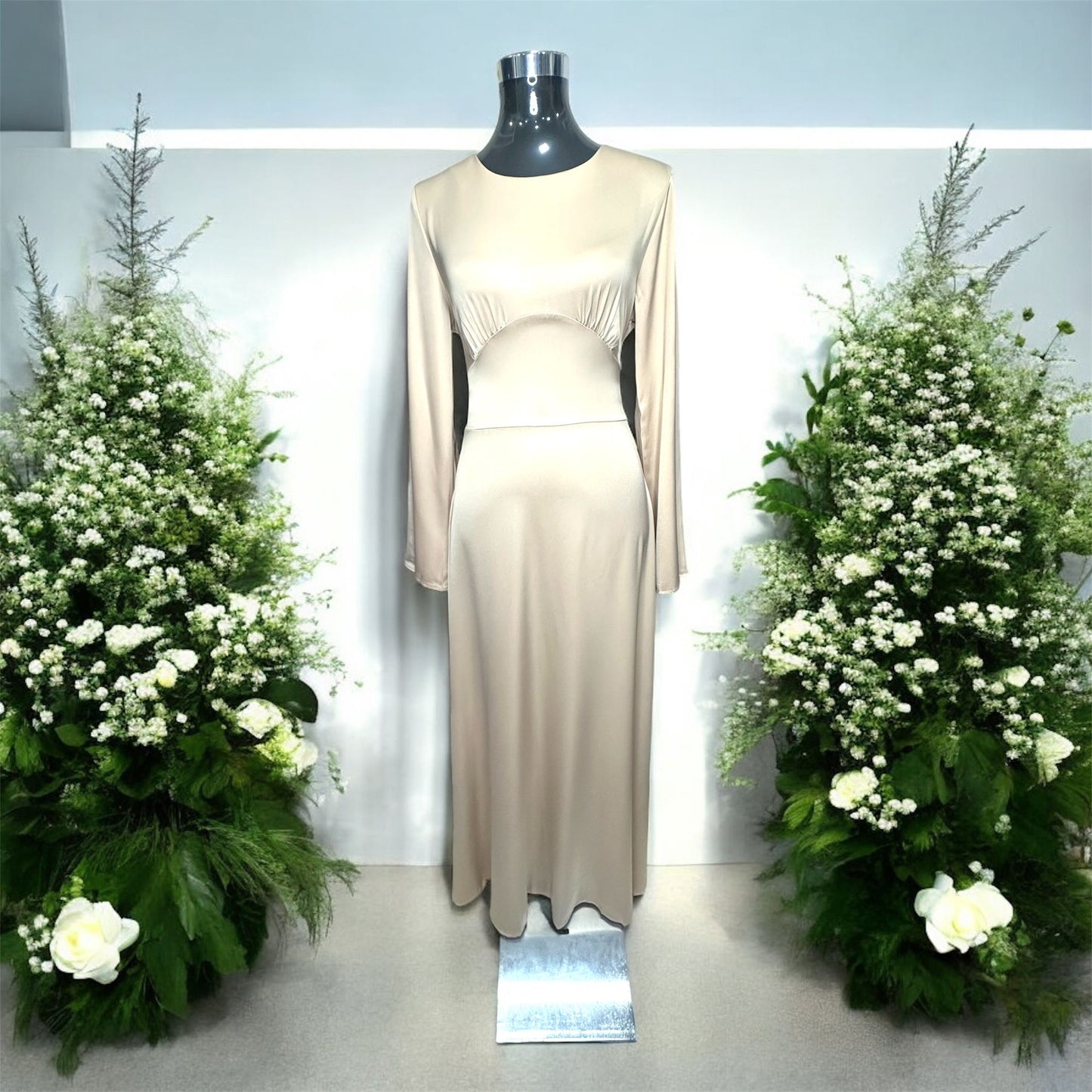 Liyana Minimalist Dress, A sleek, body-contouring dress designed to flatter every curve. Crafted with a smooth, elegant finish, this piece features a corset-style lace-up detail at the back, allowing adjustable shaping for a snatched waist and perfect fit. Long sleeves and a graceful silhouette make it effortlessly refined—where structure meets femininity