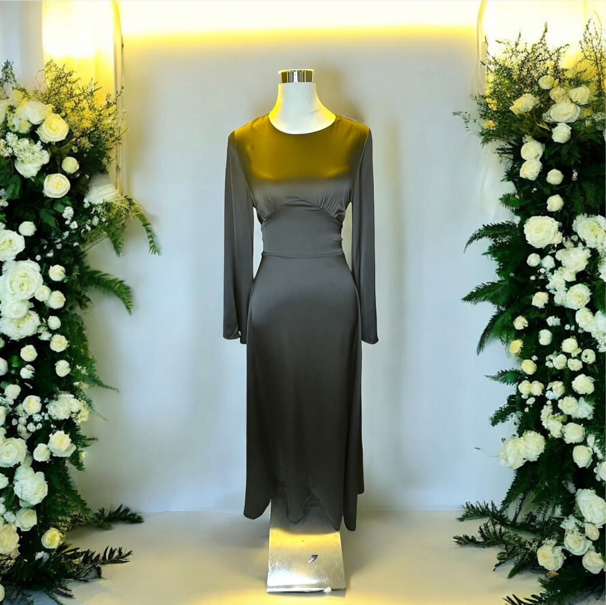 Liyana Minimalist Dress, A sleek, body-contouring dress designed to flatter every curve. Crafted with a smooth, elegant finish, this piece features a corset-style lace-up detail at the back, allowing adjustable shaping for a snatched waist and perfect fit. Long sleeves and a graceful silhouette make it effortlessly refined—where structure meets femininity