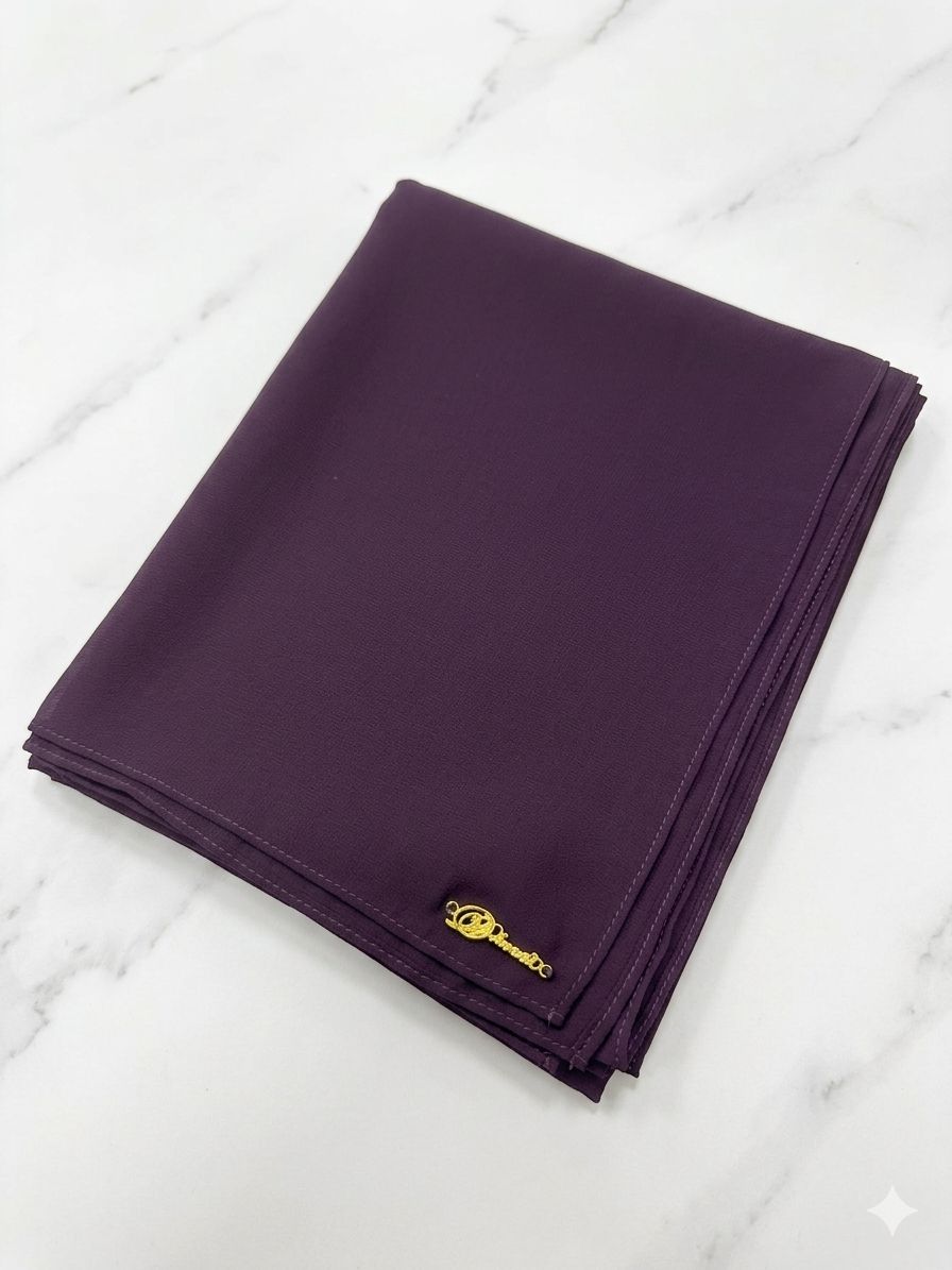 Graceful chiffon shawls with a soft, flowy drape. Light and airy, perfect for everyday wear or special occasions, finished with a subtle logo for a touch of understated elegance.
