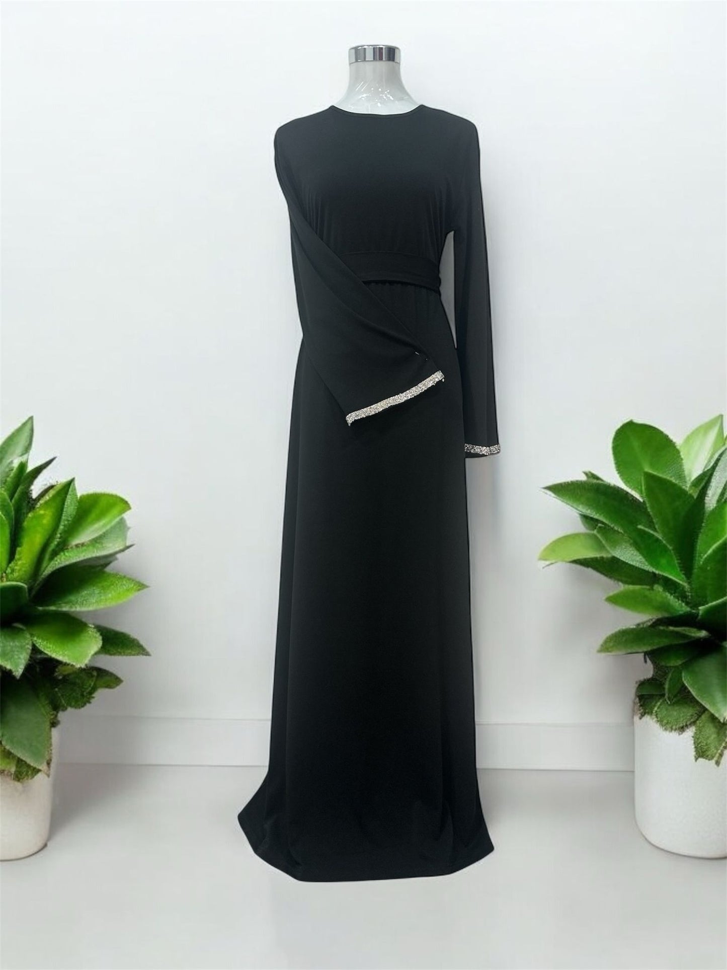 Minimalist Dress,
Black, belle sleeve
with white
stones comes with
fabri belt and invisible
zip at the back