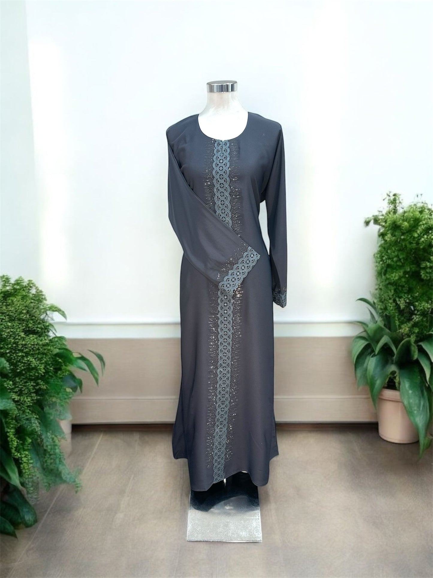 Grey Rana Jubah - with snap button, bottom sleeve and front abaya embroided and embellish
with dark brown tiny stones and comes with shawl