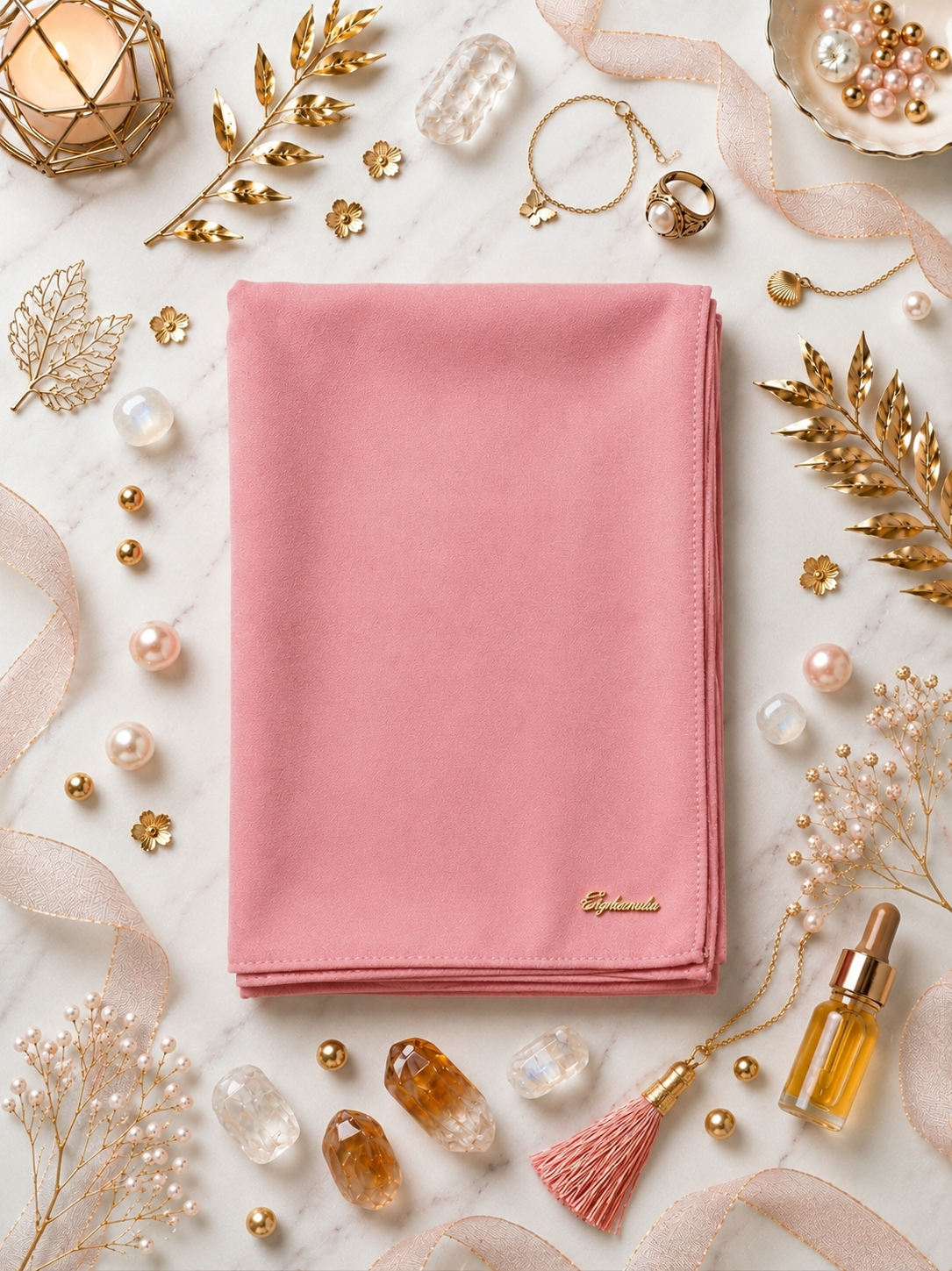 Graceful chiffon shawls with a soft, flowy drape. Light and airy, perfect for everyday wear or special occasions, finished with a subtle logo for a touch of understated elegance.