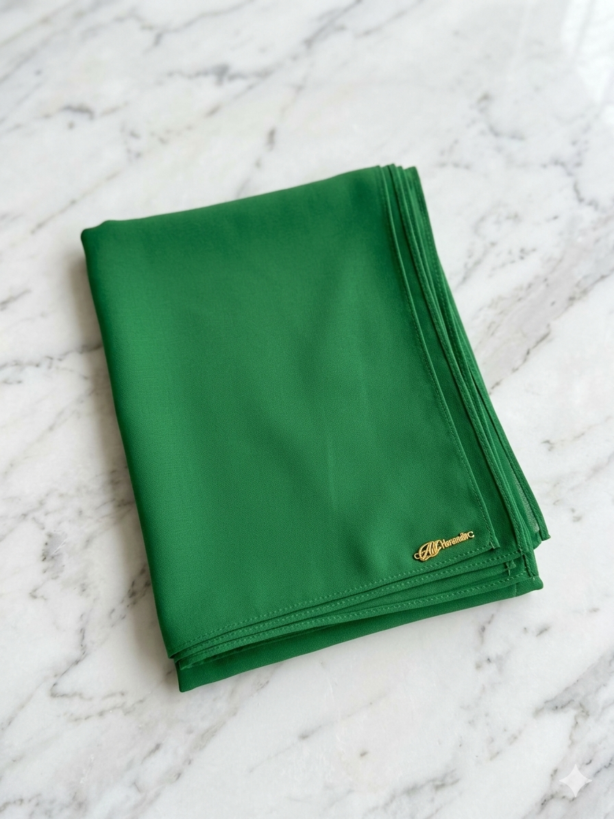Graceful chiffon shawls with a soft, flowy drape. Light and airy, perfect for everyday wear or special occasions, finished with a subtle logo for a touch of understated elegance.