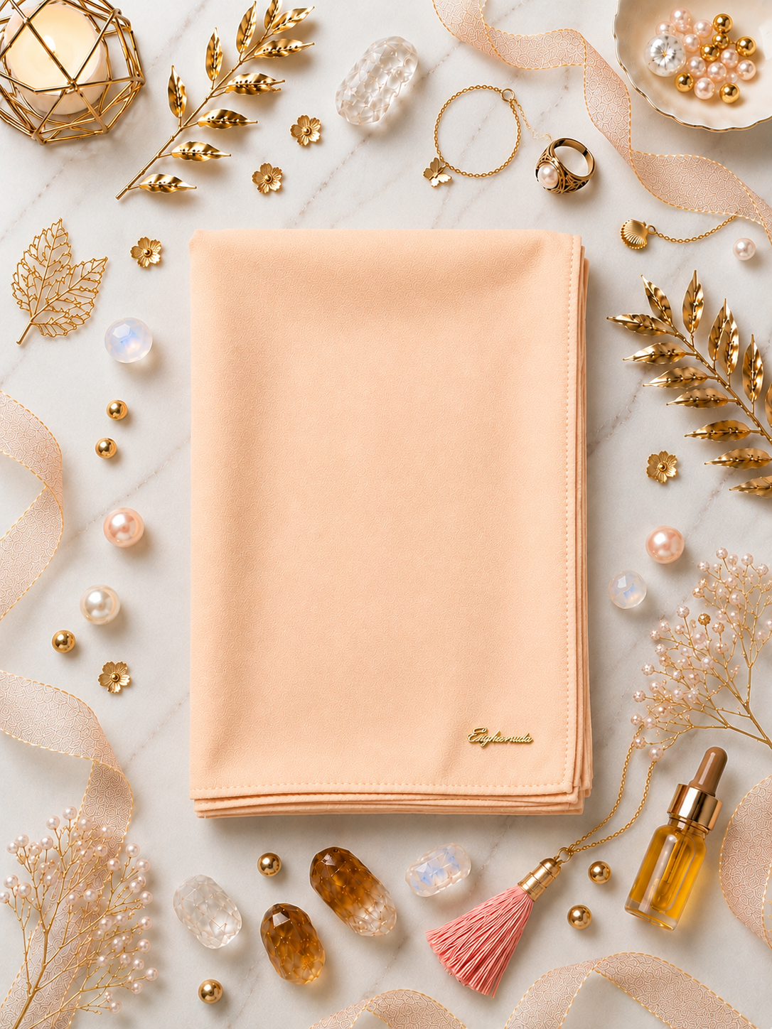 Graceful chiffon shawls with a soft, flowy drape. Light and airy, perfect for everyday wear or special occasions, finished with a subtle logo for a touch of understated elegance.