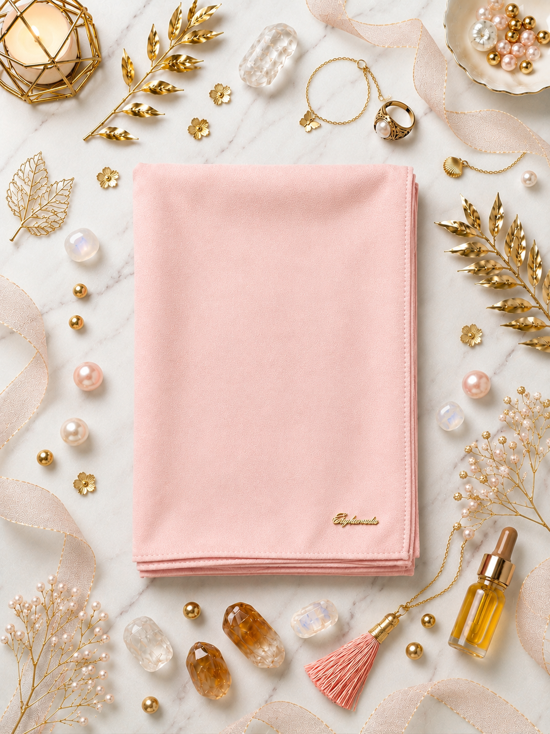 Graceful chiffon shawls with a soft, flowy drape. Light and airy, perfect for everyday wear or special occasions, finished with a subtle logo for a touch of understated elegance.