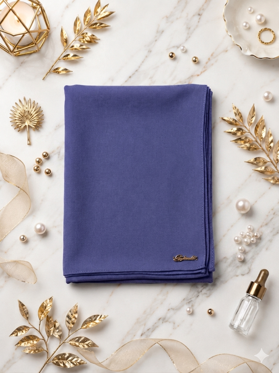 Graceful chiffon shawls with a soft, flowy drape. Light and airy, perfect for everyday wear or special occasions, finished with a subtle logo for a touch of understated elegance.