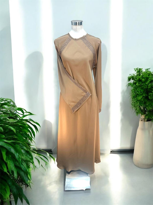 Brown Yusrah Jubah with zip on the left shoulder, the sleeve and side area embellished with brown stones. and it comes with shawl




