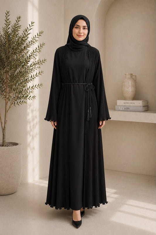 Two-piece set: Open pleated abaya & matching inner dress
Premium lightweight pleated fabric
Relaxed, modest silhouette
Adjustable self-tie waist cord
Delicate ruffle finish on sleeves and hem
Full-length design
Comfortable, breathable, and flowy