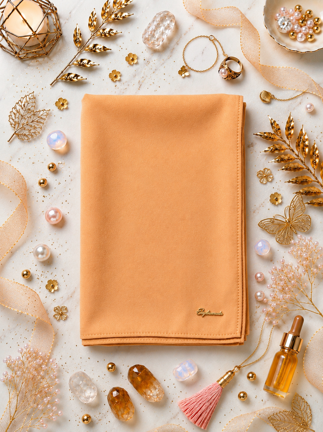 Coral Sunset Graceful chiffon shawls with a soft, flowy drape. Light and airy, perfect for everyday wear or special occasions, finished with a subtle logo for a touch of understated elegance.