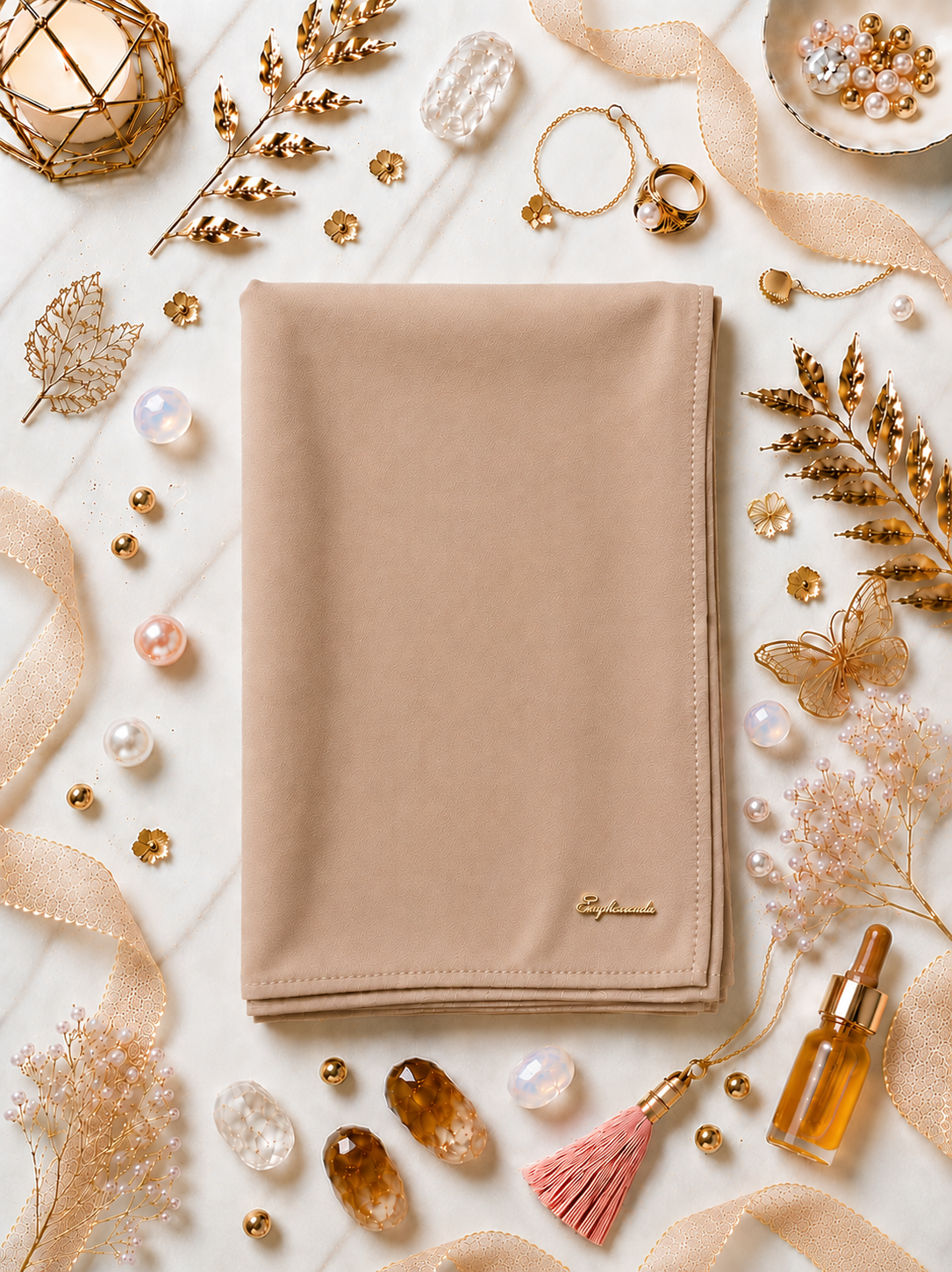 A graceful colour shawl crafted from lightweight chiffon, designed to drape effortlessly with a soft, flowing silhouette. The delicate fabric offers an airy feel and subtle elegance, making it perfect for both everyday wear and special occasions. Finished with a demure logo subtly placed at the corner, this shawl adds a refined touch of understated luxury without overpowering the design.