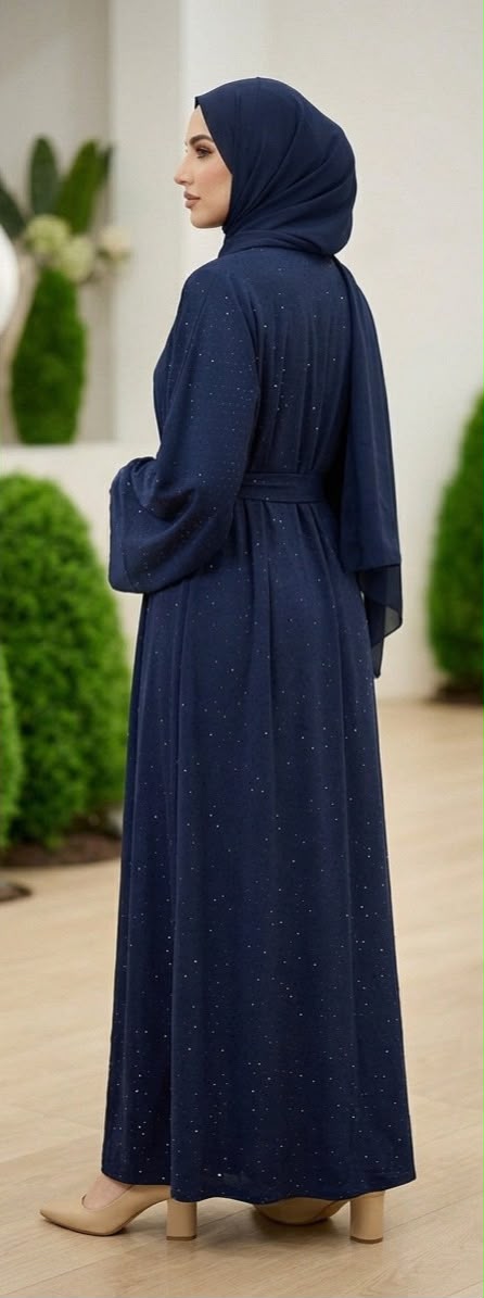 Navy Lamura Abaya was designed in an overcoat style, featuring delicate blue stone embellishments across the overcoat for sophisticated looks and short sleeve innerwear providing comfort. Comes complete with a coordinating cloth belt and matching shawl.