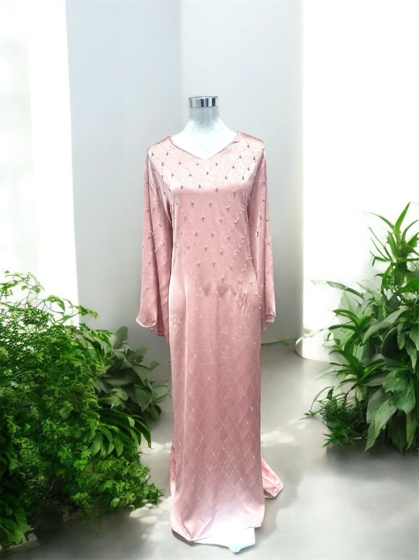 Our Pink Dhiya Jubah Collection was made with a flattering V-neckline, beautifully detailed with delicate white stone embellishments.
Raised stones add dimension, texture, and a soft, radiant sparkle for an effortlessly elegant finish.